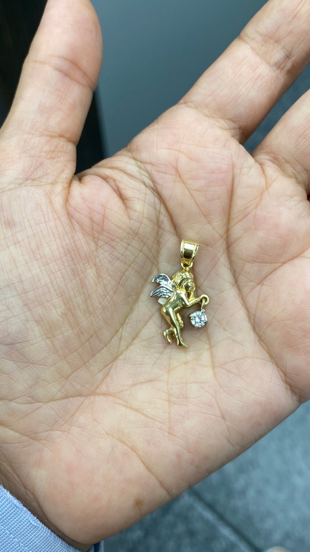 Two tone gold angel pendant