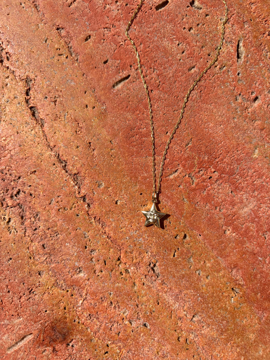 Large star with face charm